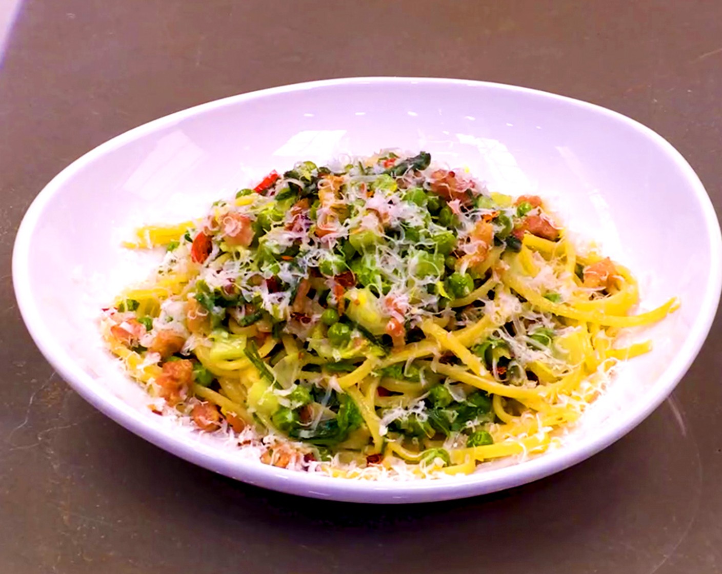 step 11 Serve the pasta with a sprinkle of Crushed Red Pepper Flakes (to taste) and freshly grated Pecorino Romano Cheese (to taste).