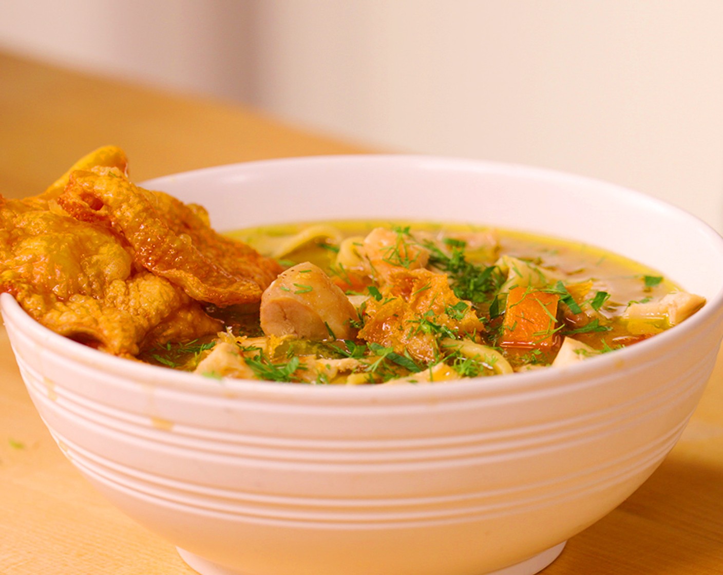 step 11 Top the chicken noodle soup with chopped Fresh Parsley (to taste) and Fresh Dill (to taste) and crumble the crispy chicken skin.