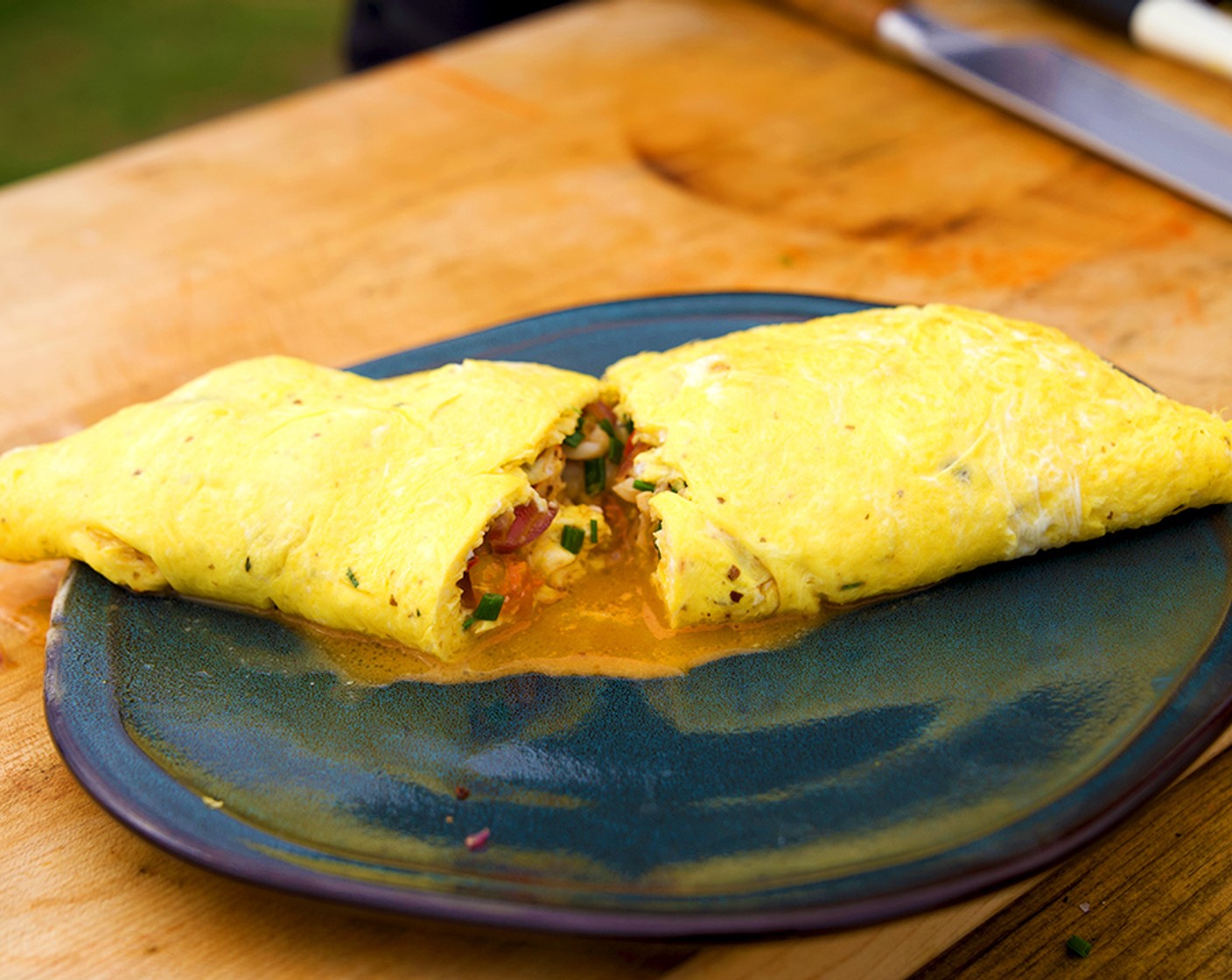 step 14 To remove from the pan, bring a plate to the pan and pour the omelette on the pan so the seam is on the bottom of the plate.