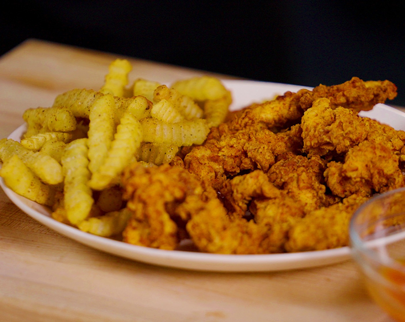 step 9 Serve the chicken with the fries, special sauce, and buffalo sauce.