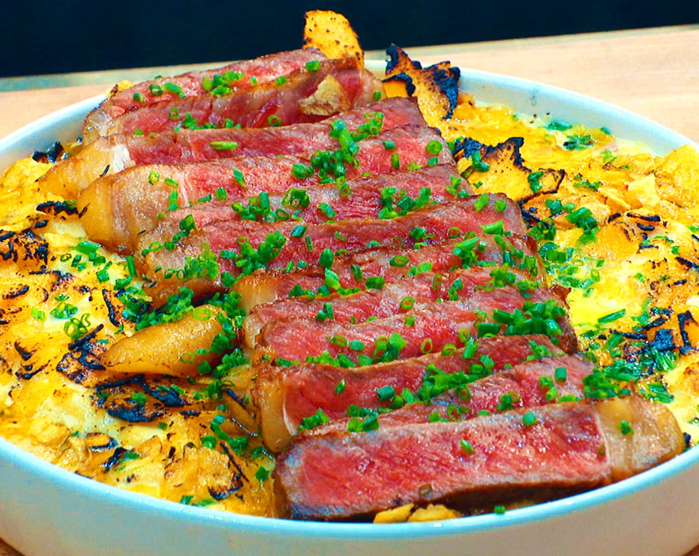 step 16 Finish by topping with the sliced steak and sprinkle of Fresh Chives (2 Tbsp).