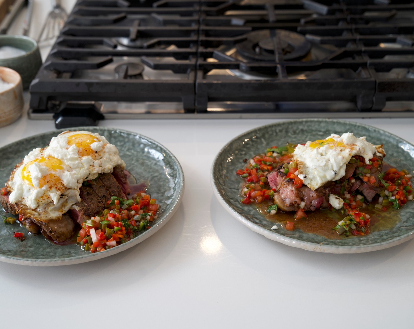 step 4 Slice the steak and layer with the pico de gallo. Top with the eggs and serve with Small Corn Tortillas (as needed) and Hot Sauce (to taste).