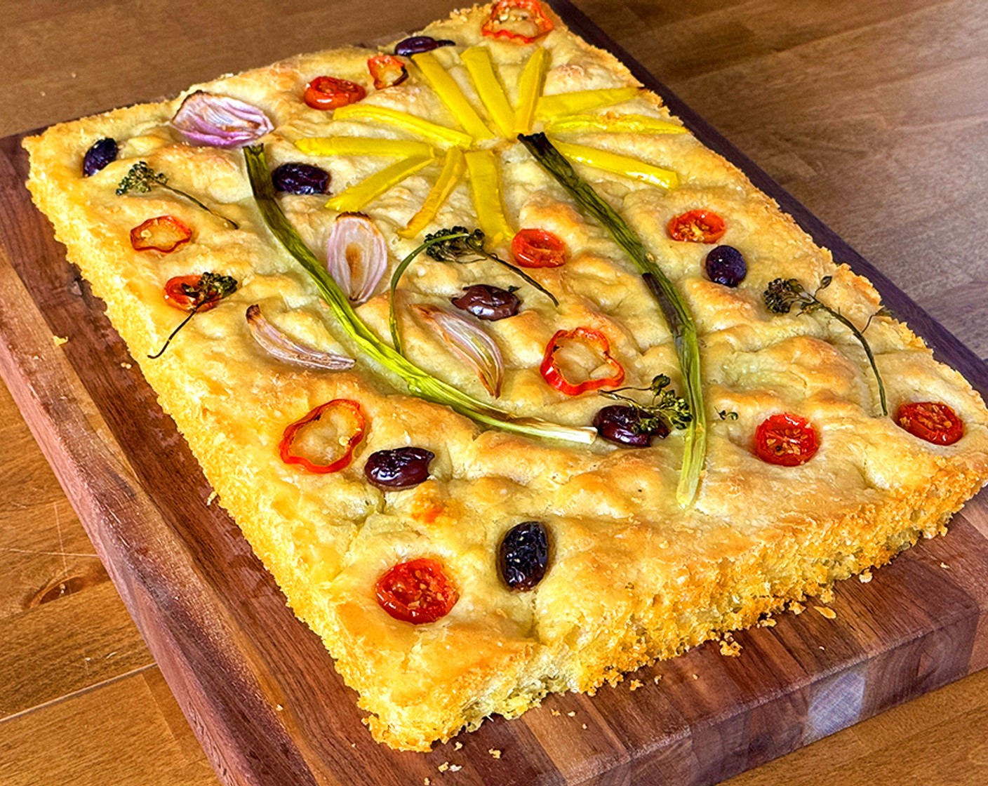 step 12 Allow the focaccia to cool in the pan for about 10 minutes before transferring to a wire rack to cool completely.